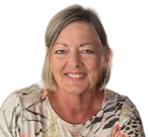 pictured is the artist behind linspirational fine art prints, lin wilson, with gray hair wearing a patterned top on a white background